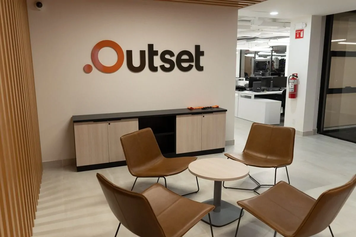 Outset Medical lounge area with collaborative seating and branded wall in San Diego